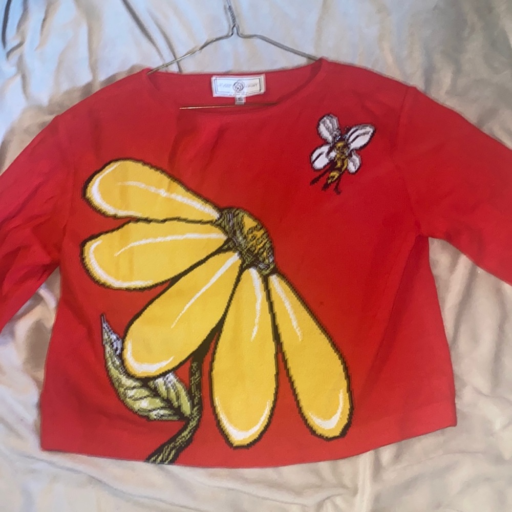 Red St. John Sport by Marie Gray big yellow flower with a little bumble bee